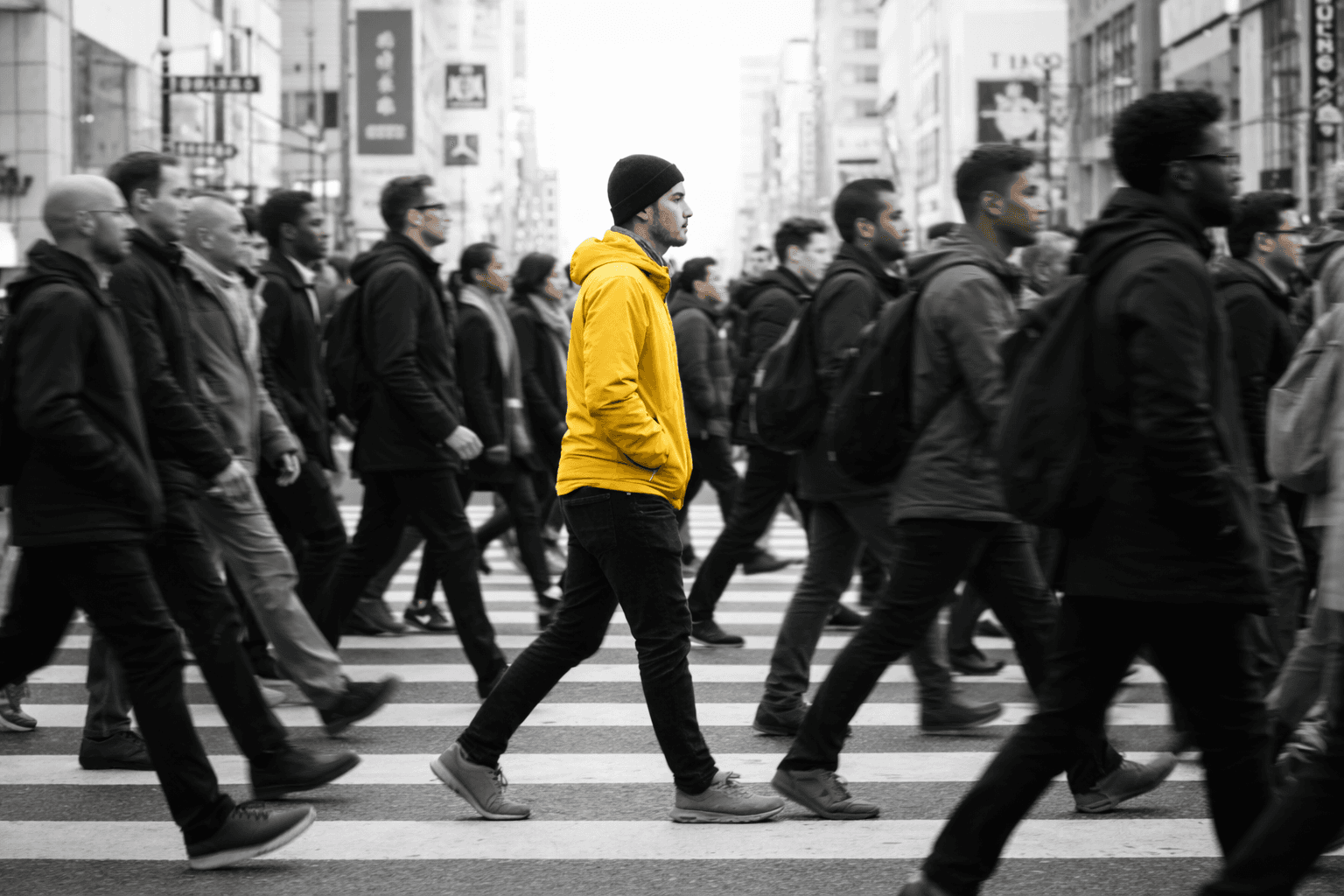Black and white street scene with figure in yellow coat, representing the isolation of clinical trial dropout